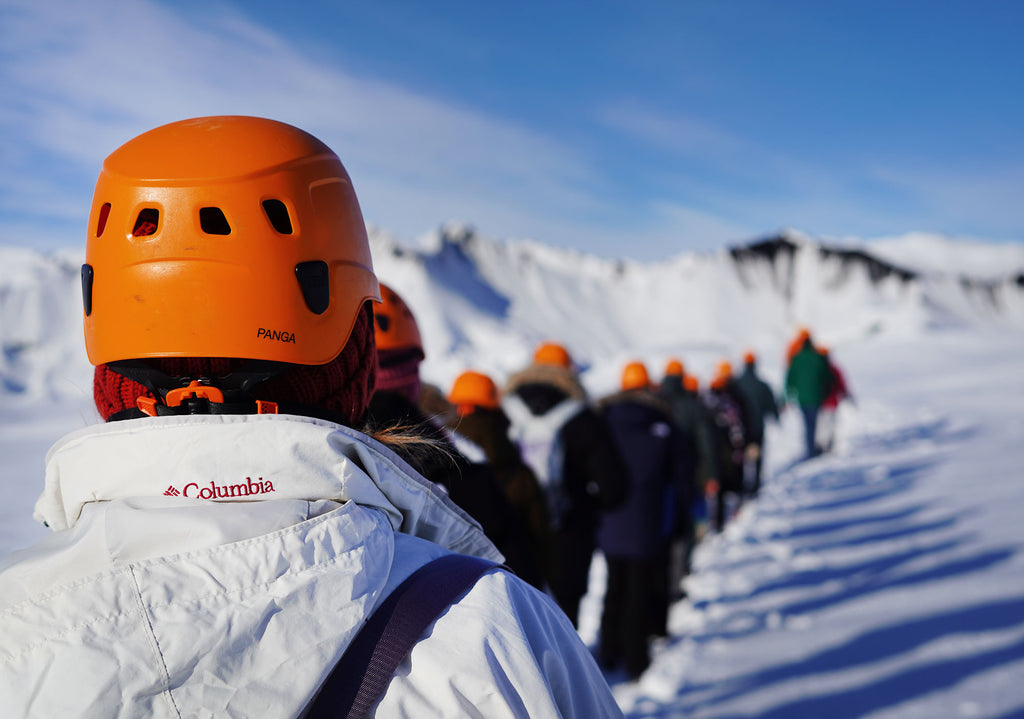 When we got to the glaciers we were given crampons (metal spikes to strap on your boots) and helmets before heading through them. The first one was very tall but also short so you walked through it quickly. The second was huge, to the extent that you had to use a series of wooden planks to walk through it with guide ropes. One slip and you could fall through a gap to a very bad ending to your holiday, so this initially scared the bejesus out of me but it was such a unique thing to do that we loved every second of it.