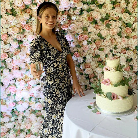 Photo of Lucy Burton with one of her Wedding Cakes