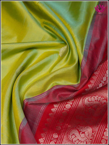 Gadwal silk saree in Green and Red with Silver Zari