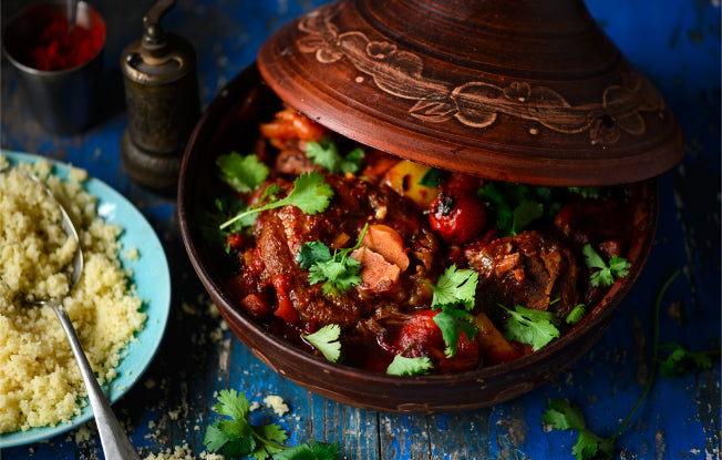 Alt: A North African tagine with couscous
