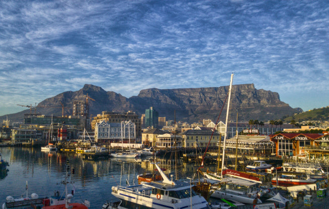 Photo by Pixabay from [Pexels](https://www.pexels.com/photo/bay-boats-cape-town-cityscape-259447/) Alt: Boats gathered at Victoria & Alfred Waterfront in Cape Town, South Africa