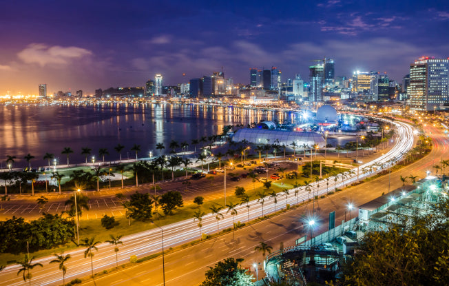 Alt: The picturesque waterfront in Luanda, Angola at night