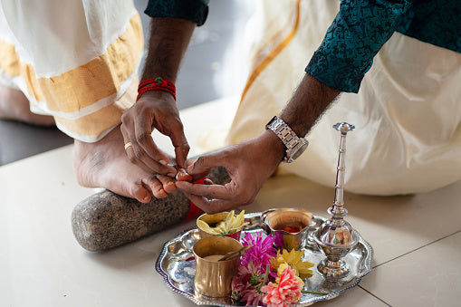 Indian bride and groom performing traditional Karnataka rituals