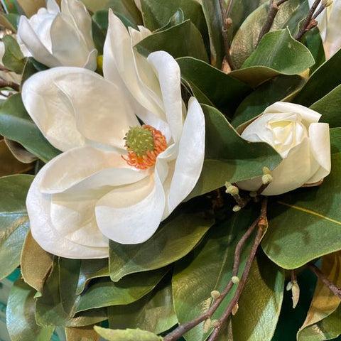 Close-up of a clean faux magnolia arrangement