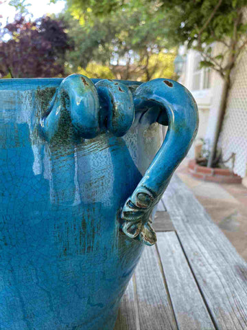 Close-up of blue decorative vase