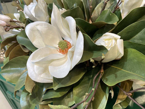A hand-crafted magnolia bloom