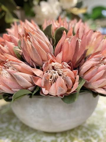 Pink protea in stonecast bowl