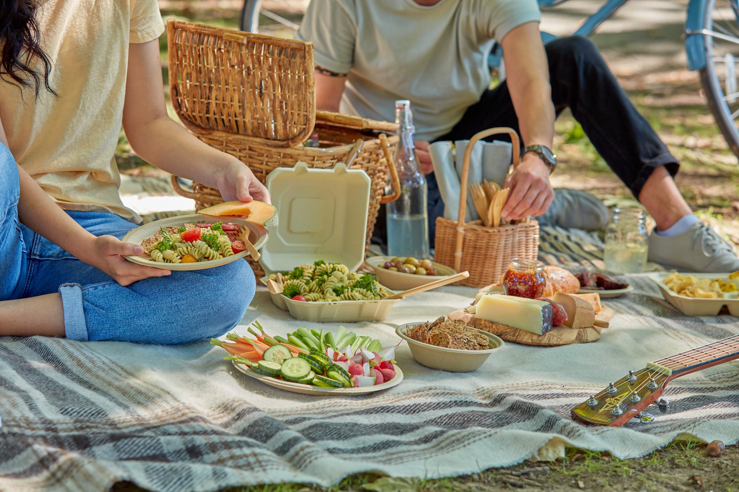 Picnic in winter, sausages lie on a table in a Tupperware box. There are  thermos flasks next to them Stock Photo - Alamy