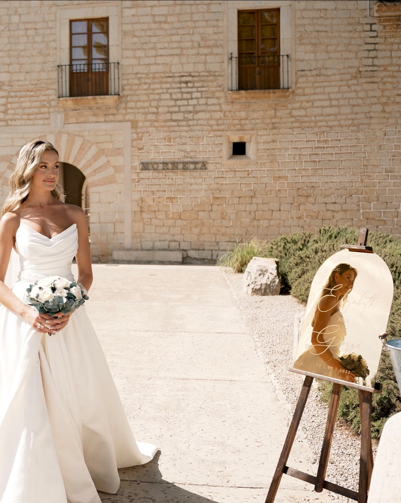 gold arch wedding sign