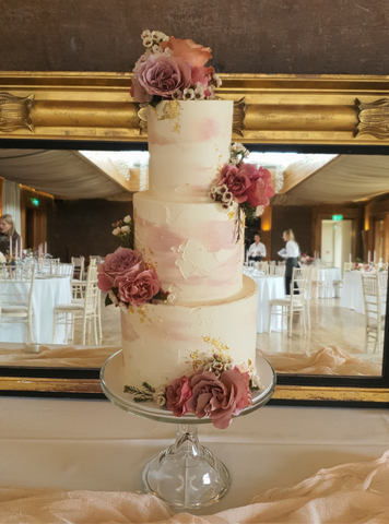 Three tiered textured buttercream iced cake