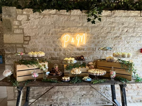 Dessert table at the Old Gore barn, Yard Space, Chocolate brownies, cupcakes, biscuits, macarons and fresh flowers