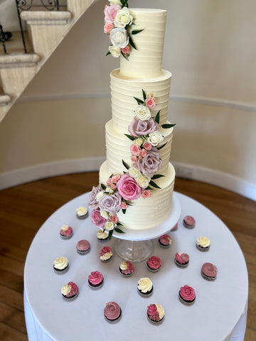 Four Tiered Wedding Cake, sugar flowers, fresh flowers and cupcakes 