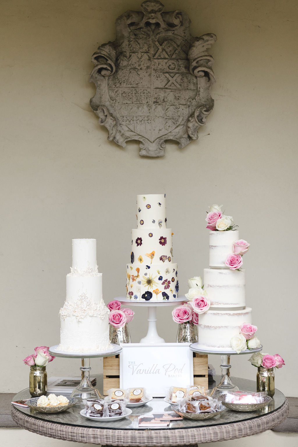 Wedding Showcase at Barnsley House - 3x wedding cakes by the vanilla pod bakery - Image by Weddings By Nicola and Glen
