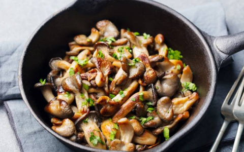 A pan full of king oyster mushrooms.