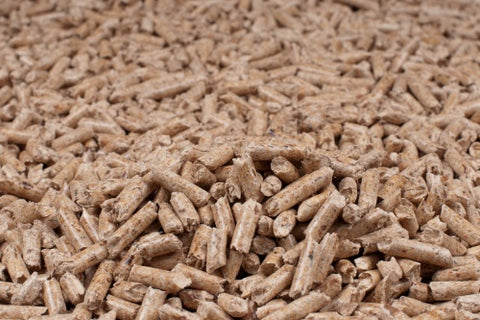 A pile of hardwood fuel pellets.