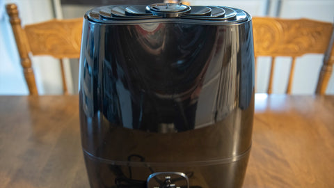 An ultrasonic humidifier on a table.
