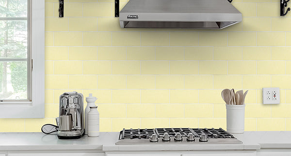 Shiny yellow peel and stick tile for kitchen backsplash