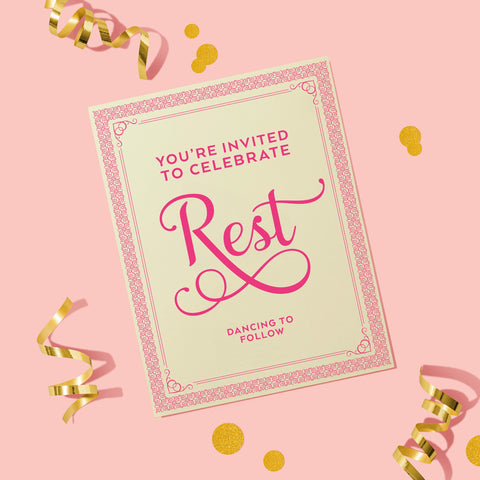 An invitation with pink text on an off-white background that says 'You're invited to celebrate rest. Dancing to follow'.