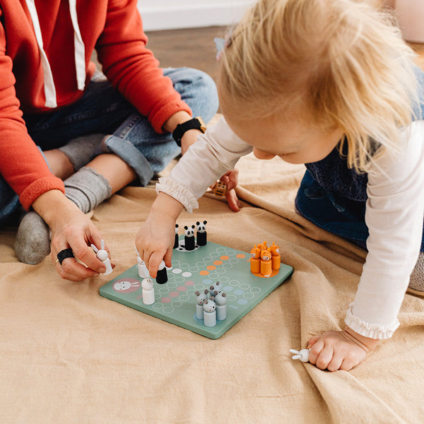 Family playing board games