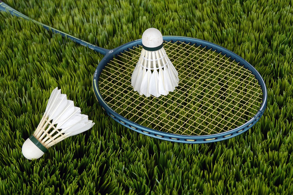 Badminton met shuttles