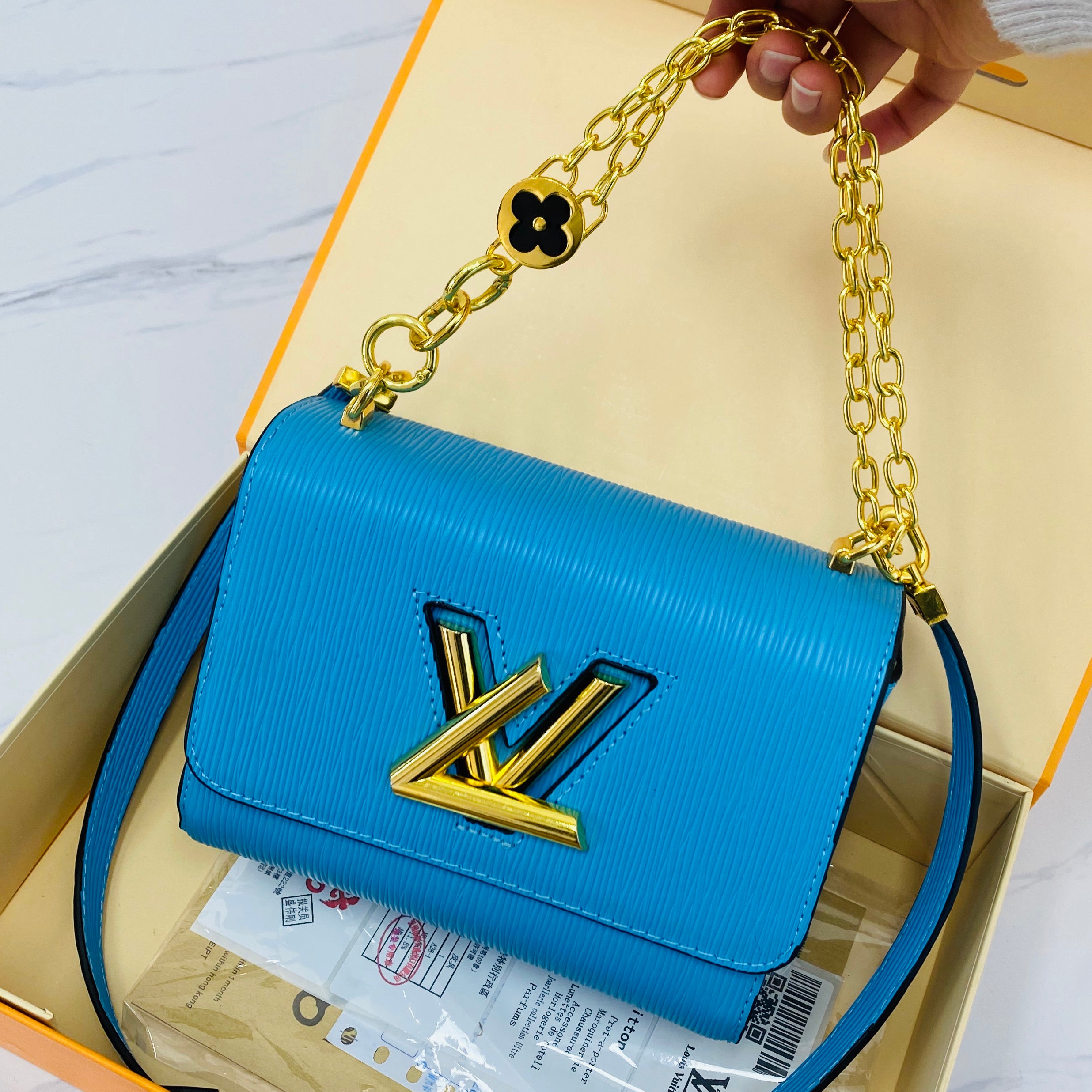 LV Louis Vuitton gold letter logo swivel buckle chain shoulder b