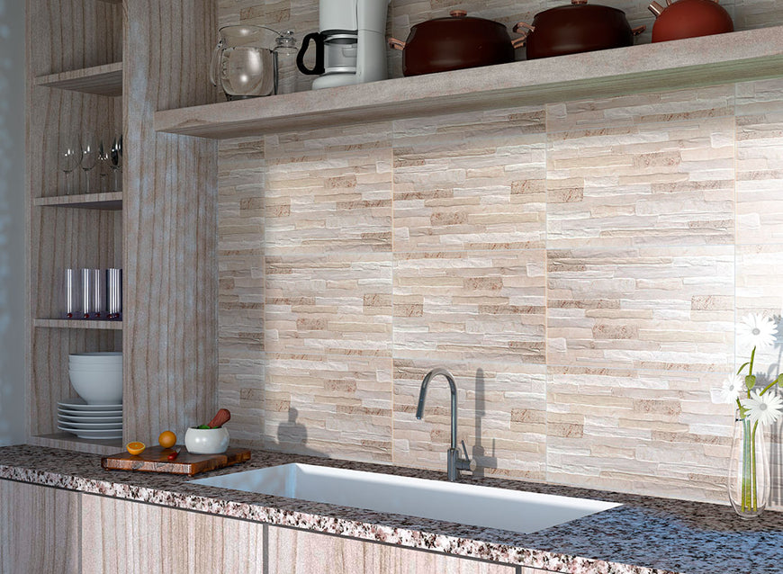 A kitchen with a natural stone look backsplash