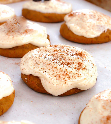Melt-in-your-mouth Pumpkin Cookies - Classic pumpkin cookies get a sweet upgrade with Baileys cream cheese frosting! | ButtercreamBlondie.com