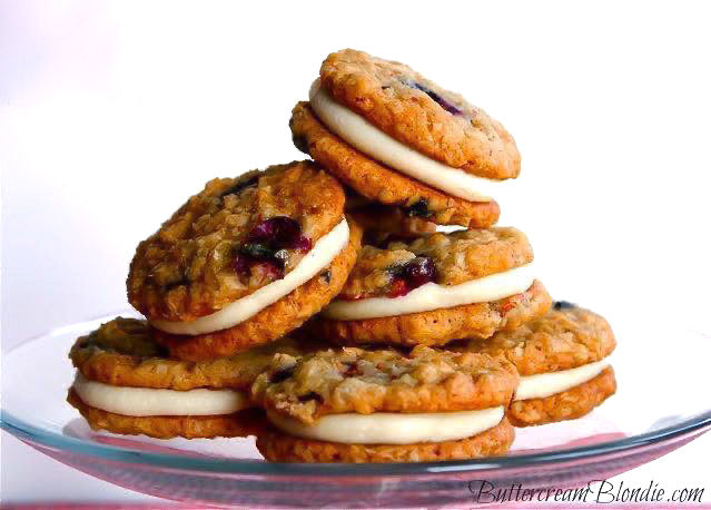 Classic oatmeal cream pies get a sweet upgrade with fresh blueberries and bourbon. Filled with a lush mascarpone filling, these easy nostalgic treats are always a hit!