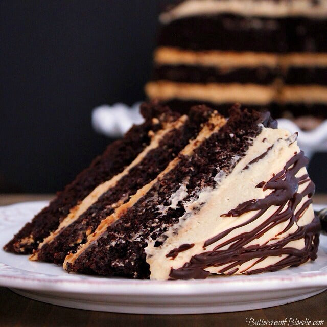 The Tipsy Whiskey Layer Cake - layers of whiskey infused chocolate cake, Irish cream buttercream and spiked mascarpone frosting! | ButtercreamBlondie.com