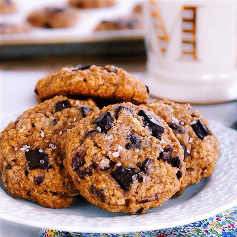 Filled with applesauce, cranberries, dark chocolate and walnuts, these cozy apple cranberry oatmeal cookies are a must bake!