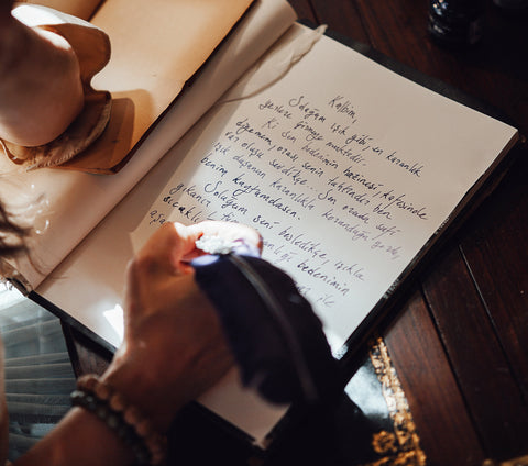 woman writing old pen