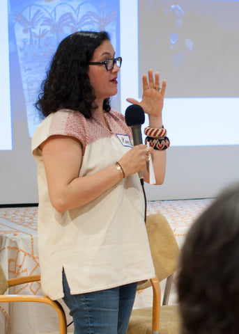 Karen Torres speaking at the Chicago Fair Trade Museum on World Refugee Day June 20, 2023