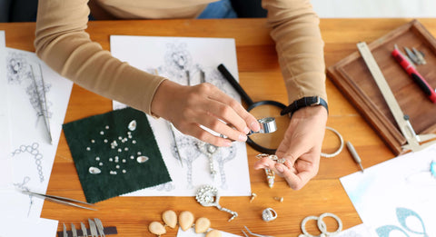 Jeweler showing customer a ring