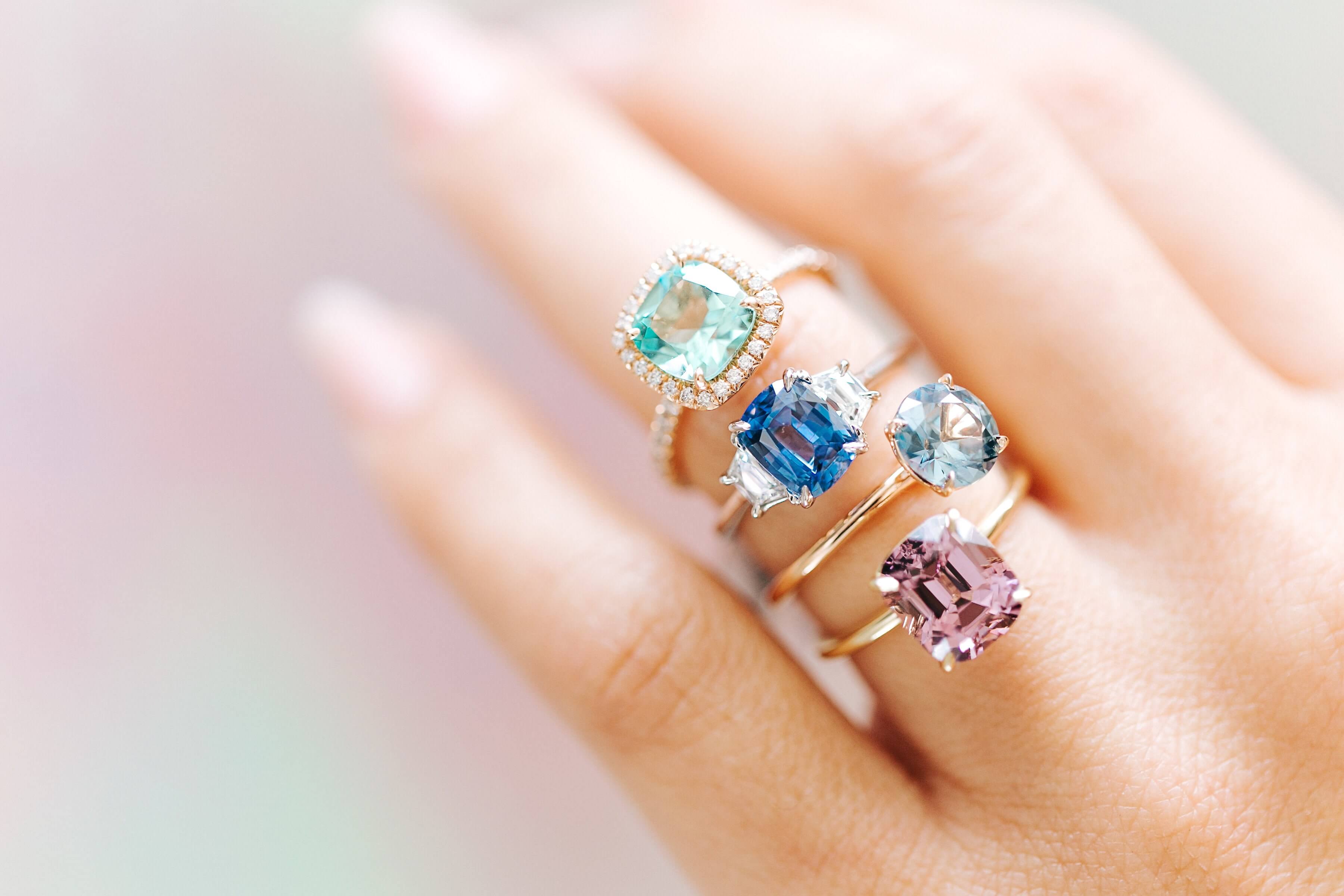 woman wearing the different September birthstone rings