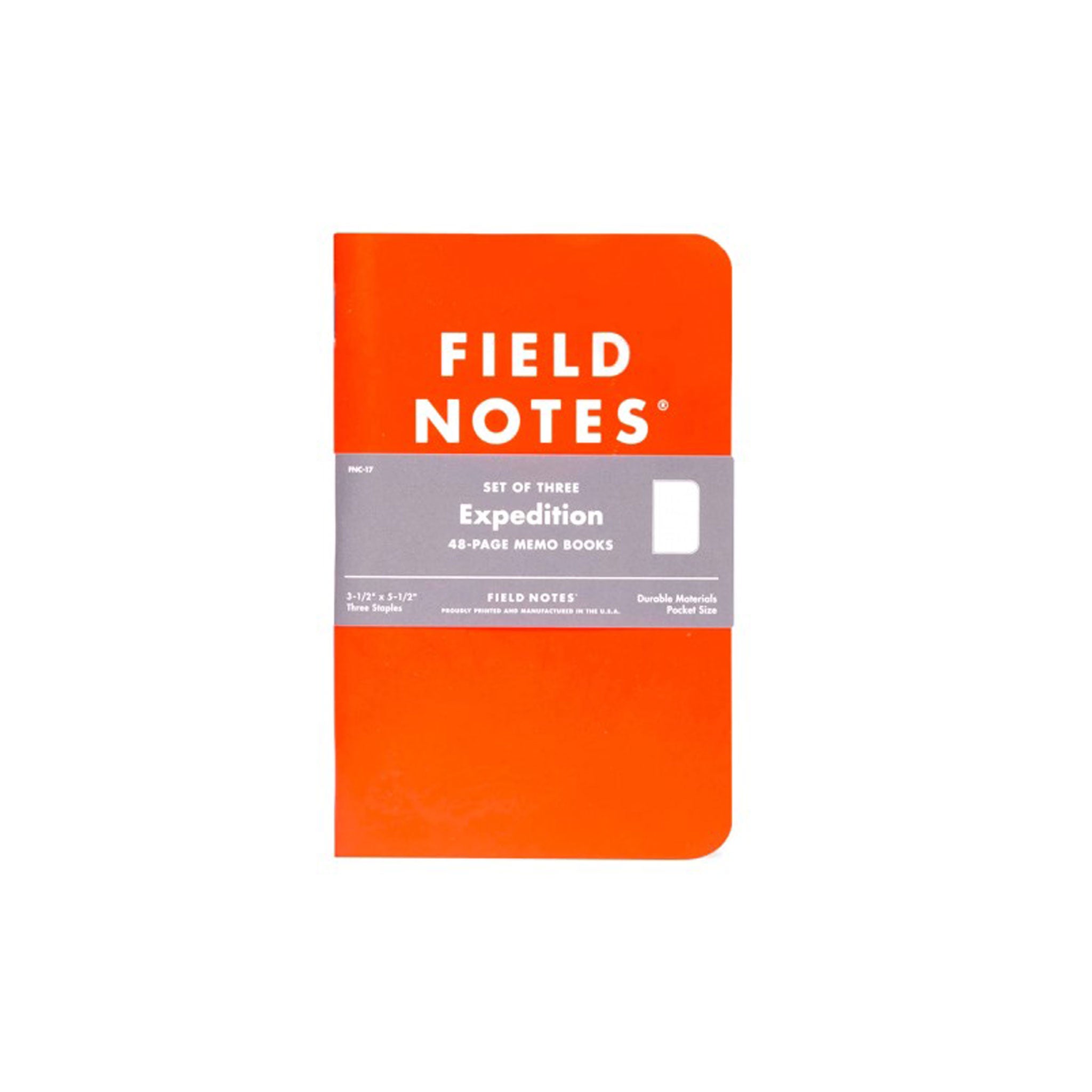 A small pack of three flourescent orange notebooks. The front cover reads "FIELD NOTES"