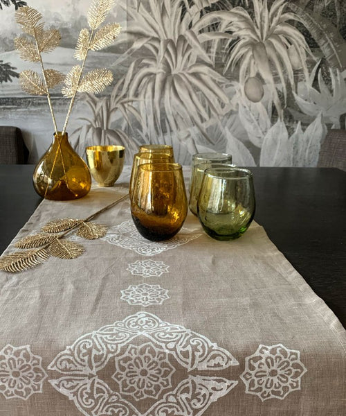 handmade tablecloth with hand blown glassware
