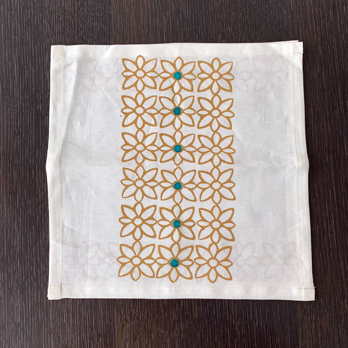white and ocher block print linen napkins