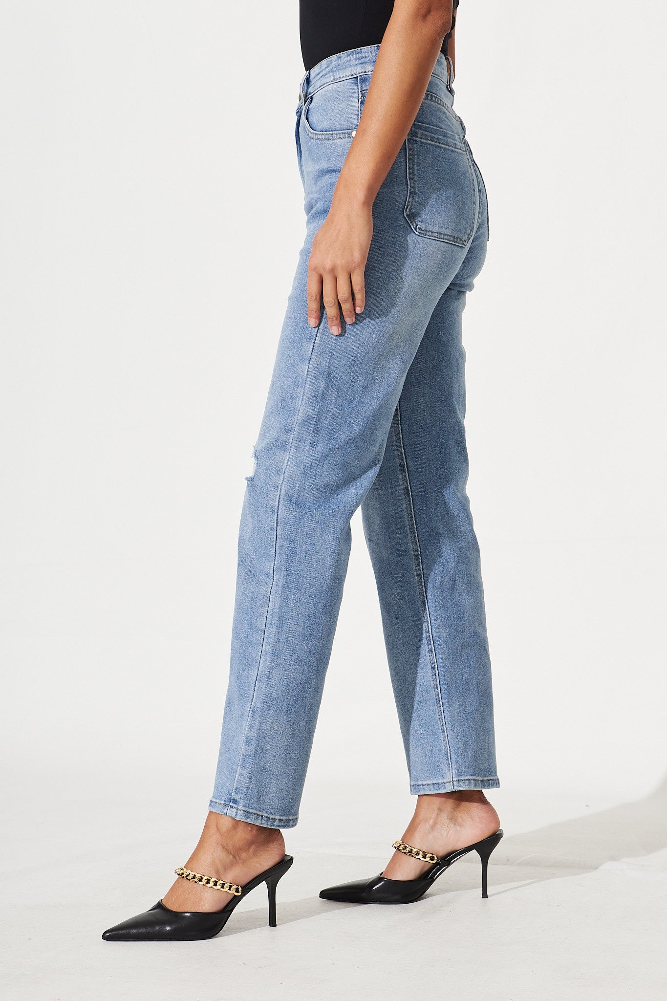 Atwood High Rise Relaxed Leg Ripped Jean In Light Blue Denim