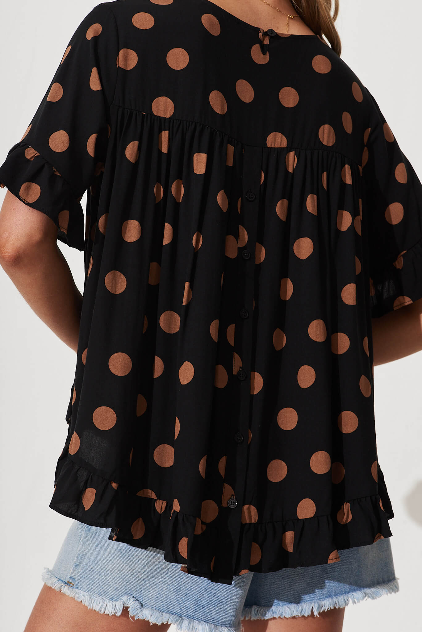 Carmeline Smock Top In Black With Brown Spot