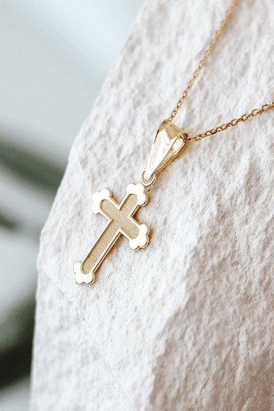 Gold cross pendant from Gloria Jewels