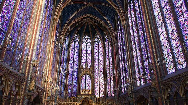 Interior of cathedral and its detailed stained glass windows