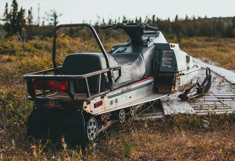 Old rusty snowmobile image