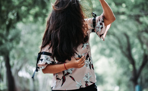  Girl Fixing Frizzy Hair