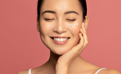 Woman Using Under Eye Cream