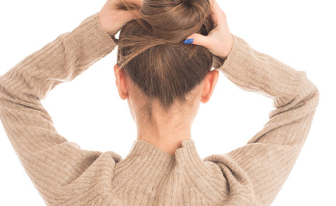 Woman Tying Her hair