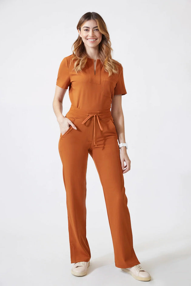 Chico's Travelers Pants Rust Orange Slinky Womens Size 1 Regular