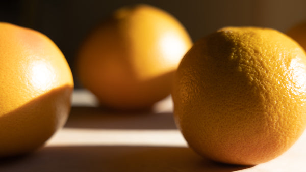 whole grapefruits in morning light