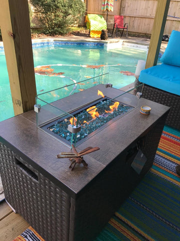 fire pit with glass wind shield