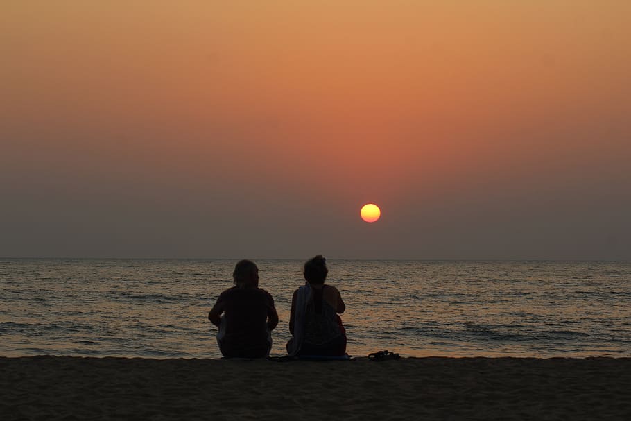 ocean sunset with couple