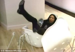 Kim Kardashian falling off a chair